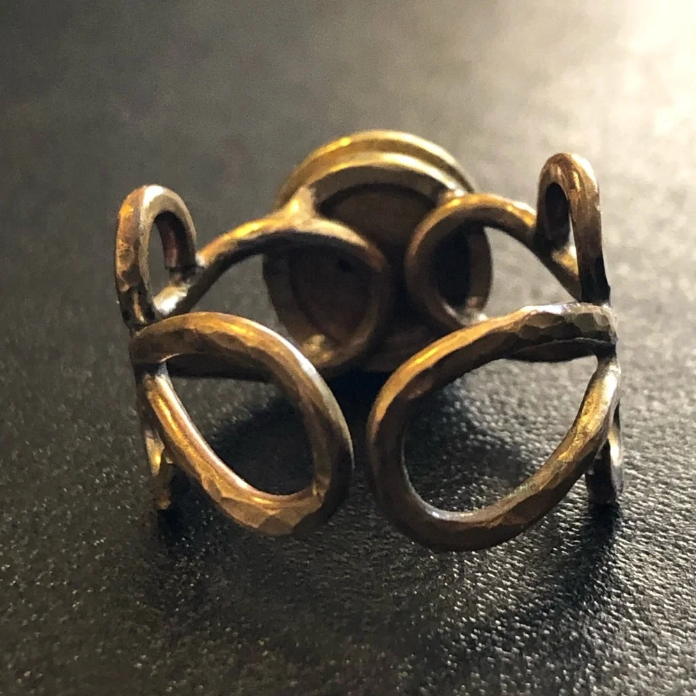Vintage handmade hammered brass bullet primer ring